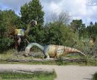 Ormanlık bir alanda üç dinozor grubu